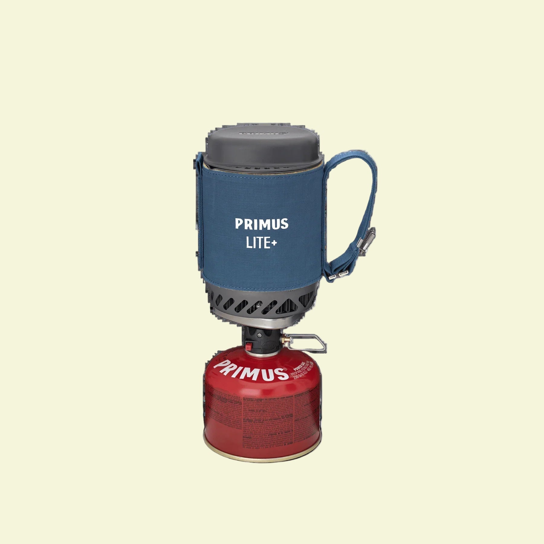 Primus Lite stove with blue container and red fuel canister on a white background