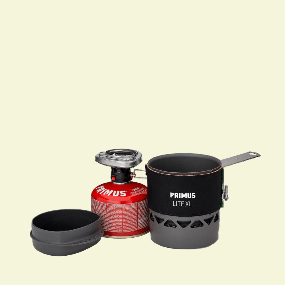 Primus LiteXLS cooking system with a fuel canister on a white background