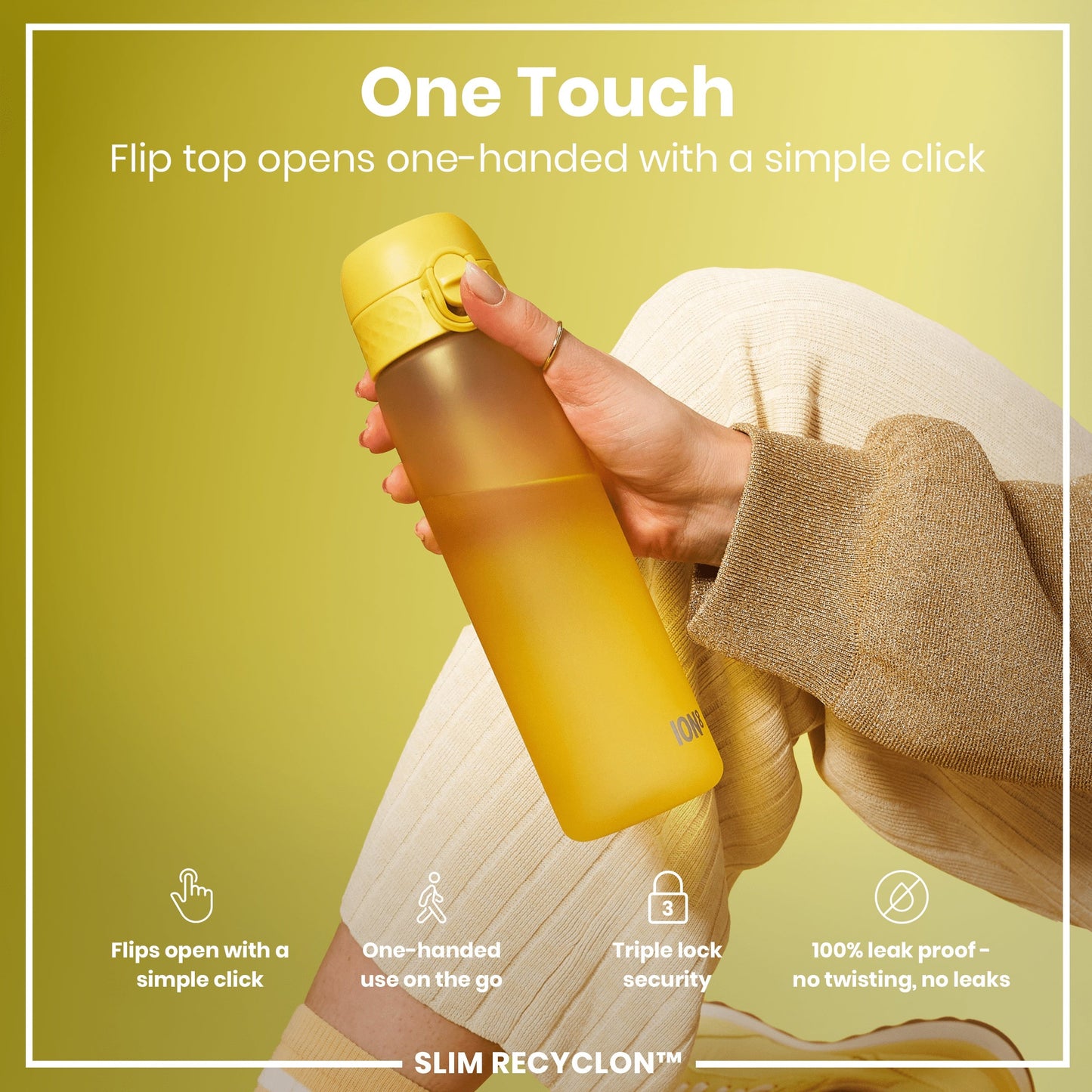 Yellow water bottle with flip top held by a hand on a green background