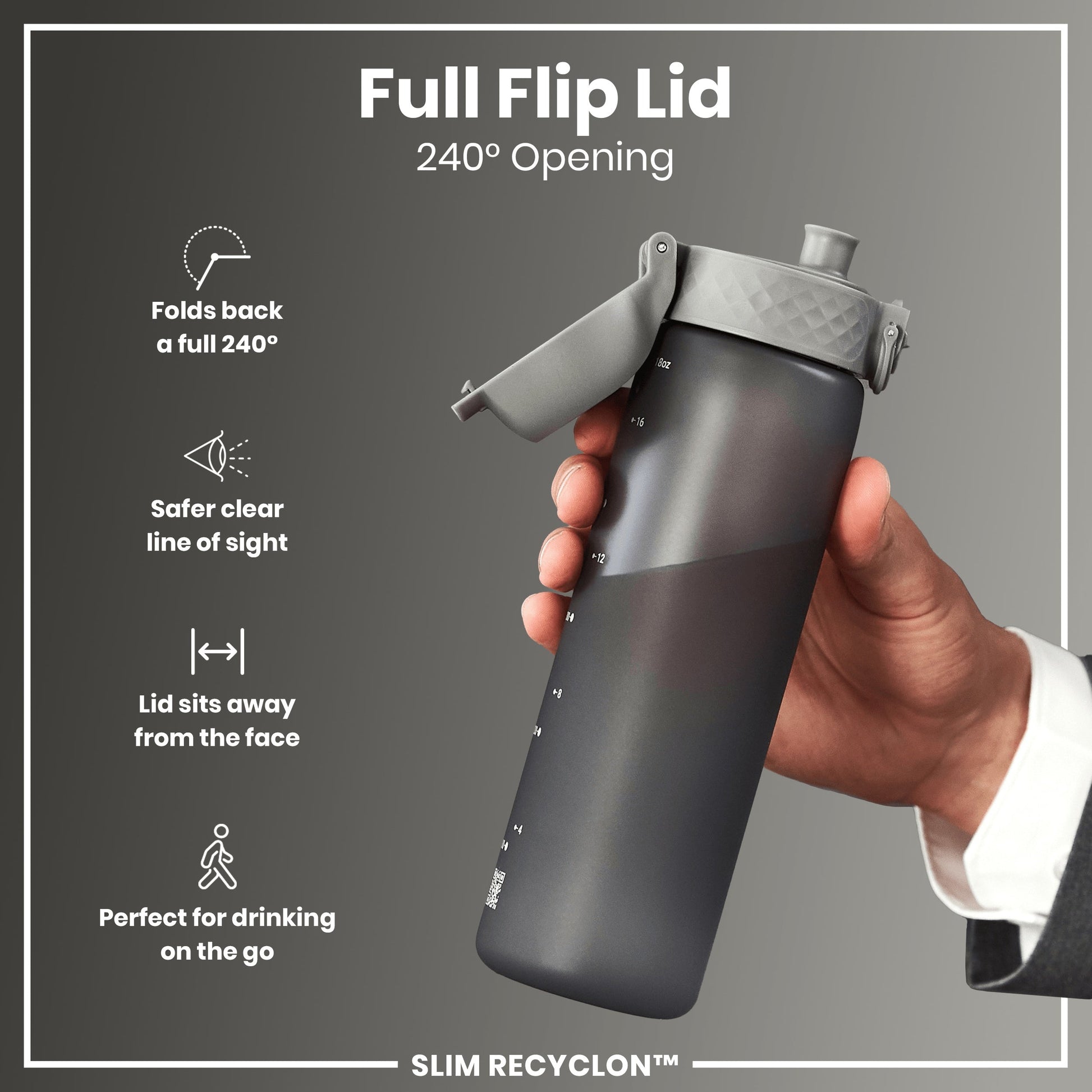 Black water bottle with a full flip lid held by a hand, on a gray background