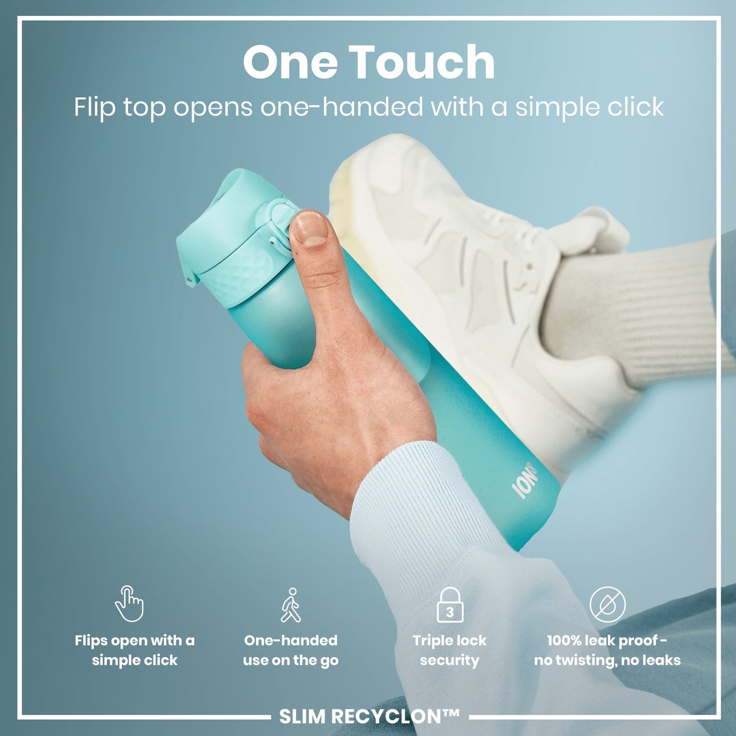 Teal water bottle with flip top being opened by a hand, on a light blue background.