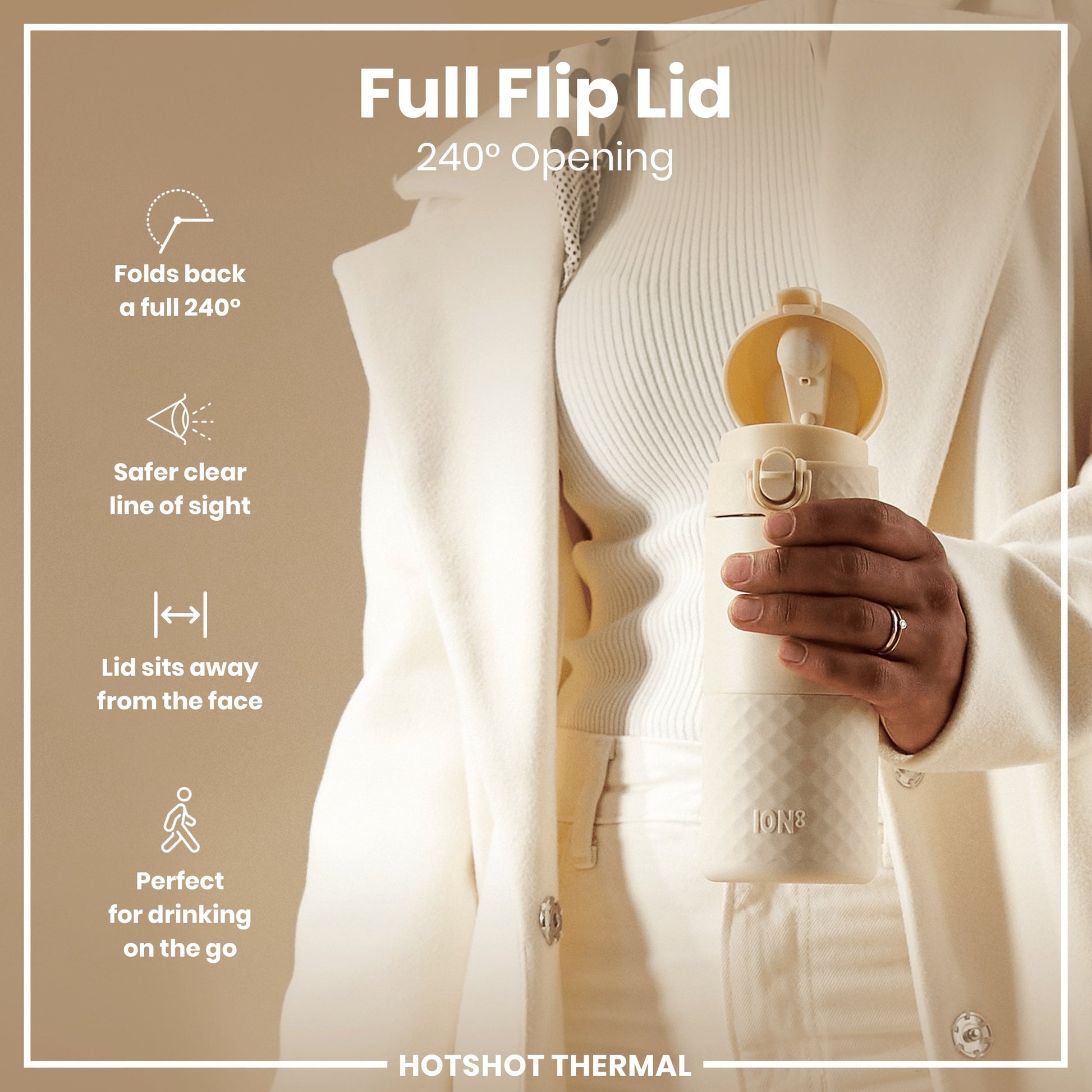 Person holding a white thermos with a full flip lid feature, set against a neutral background.