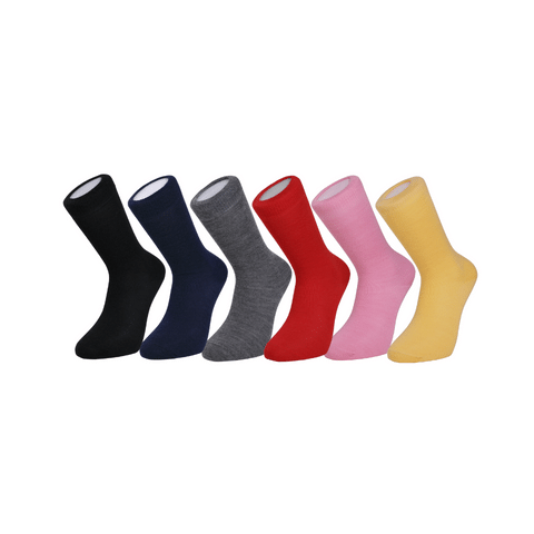 Six pairs of British-made Duchy Merino Socks in classic colors, knitted with soft, durable merino wool blend.