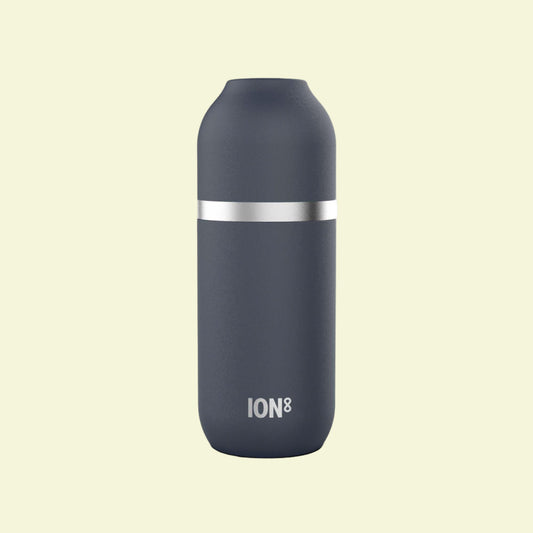 Gray insulated bottle with silver band on a white background