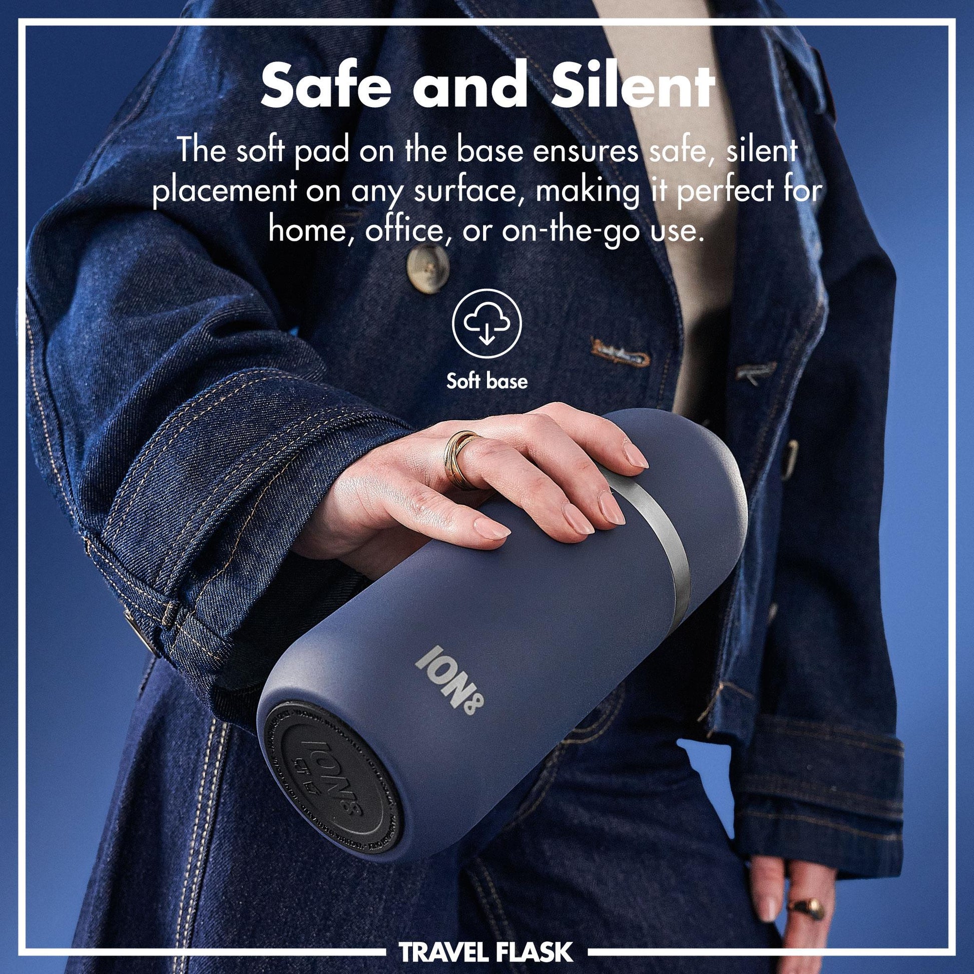 Person holding a blue travel flask with text about its safe and silent design.