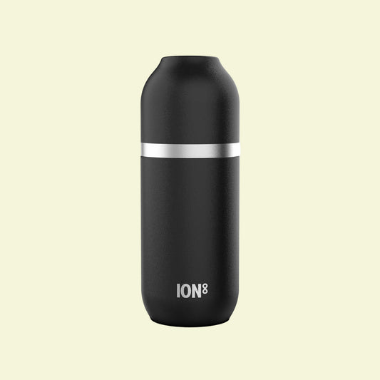Black insulated bottle with silver band on a white background, featuring the 'ION8' brand.