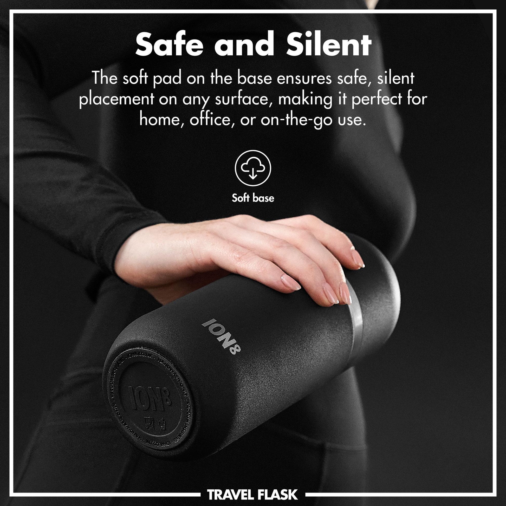 Person holding a black travel flask with text about its safe and silent design.