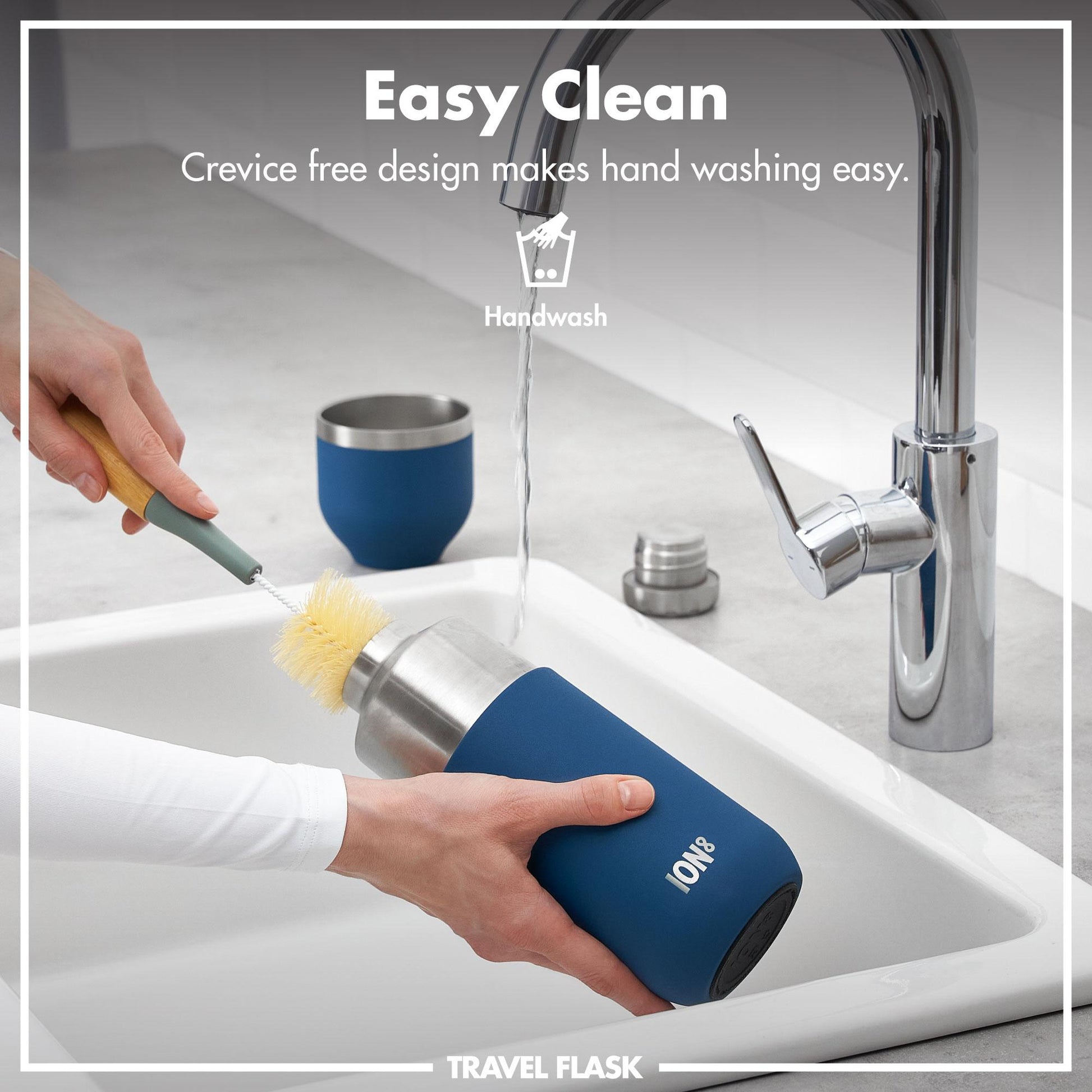 Blue travel flask being cleaned with a brush in a sink, with text indicating easy cleaning and crevice-free design.