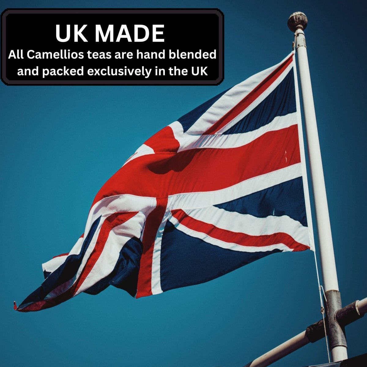 Union Jack flag against a clear blue sky with text about Camellios teas being made in the UK.
