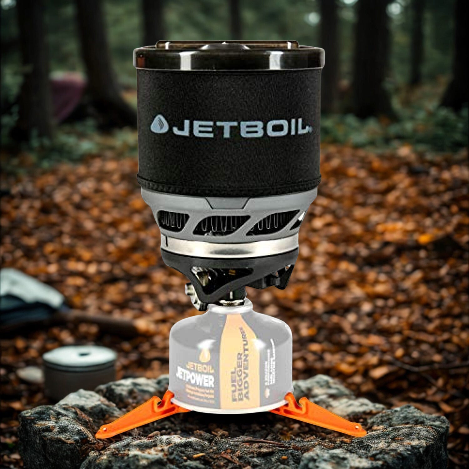 Jetboil stove on a rock with a forest background