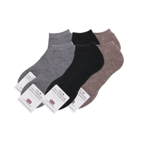 Six pairs of British made Merino Trainer Liner Socks for women in black, grey, and natural colors