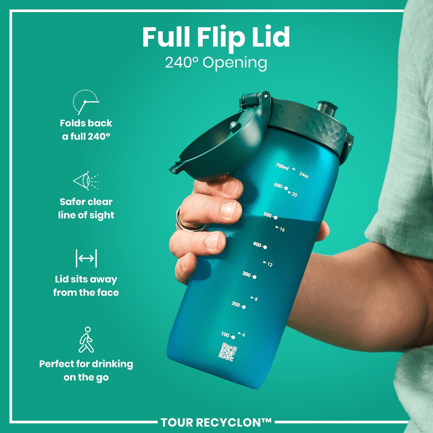 Blue water bottle with a full flip lid held by a person against a teal background