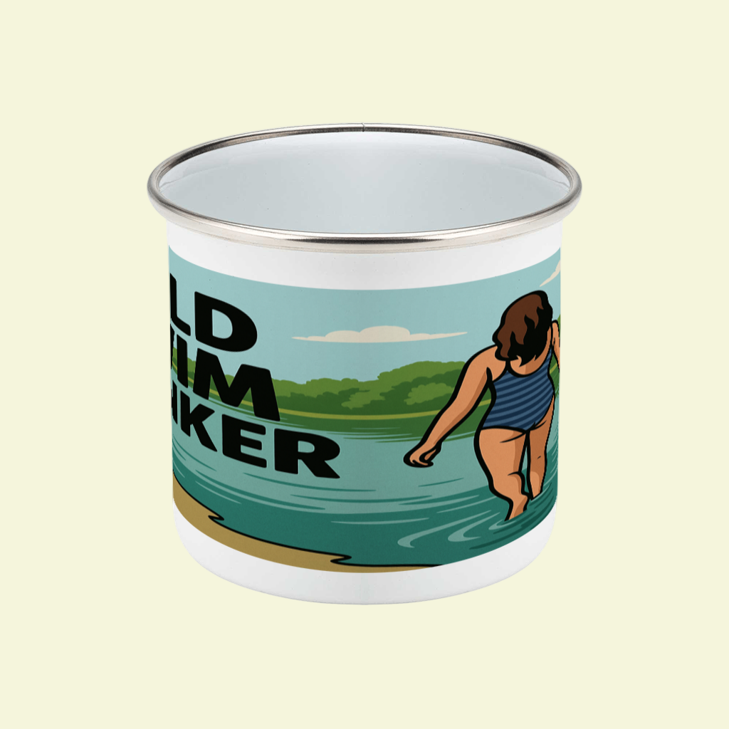 Enamel mug with a design of a person swimming and a lake background.