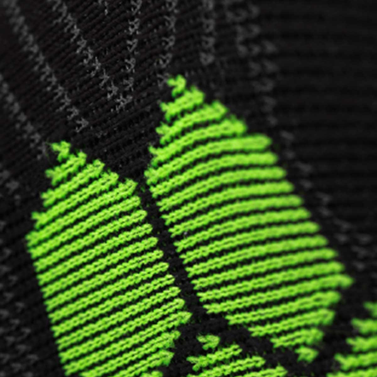 Close-up of a green logo on a black background