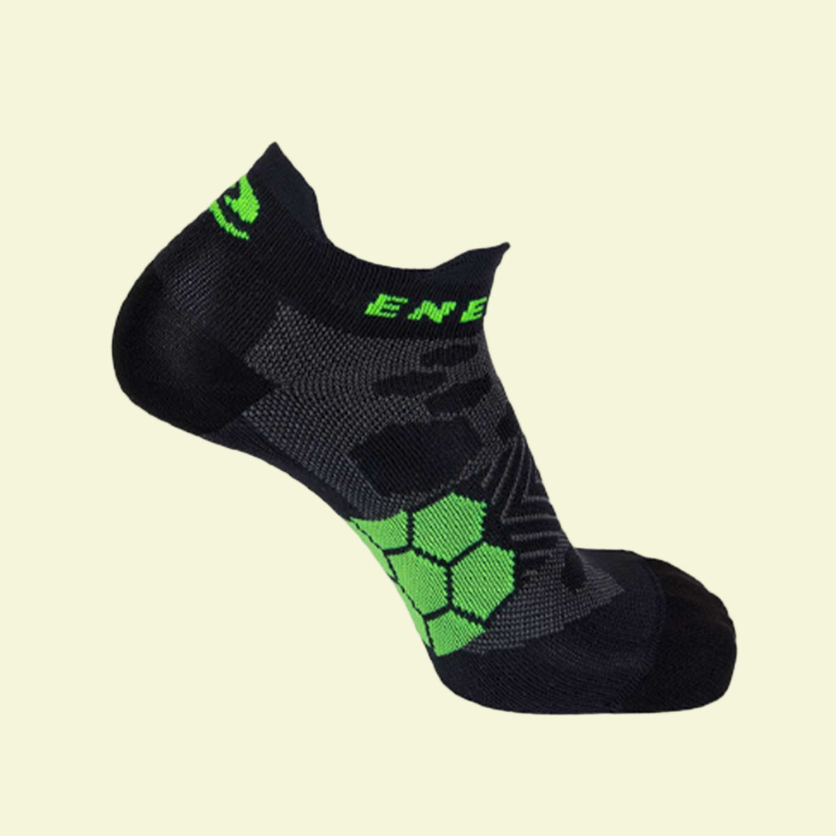 Black sock with green patterns and branding on a white background