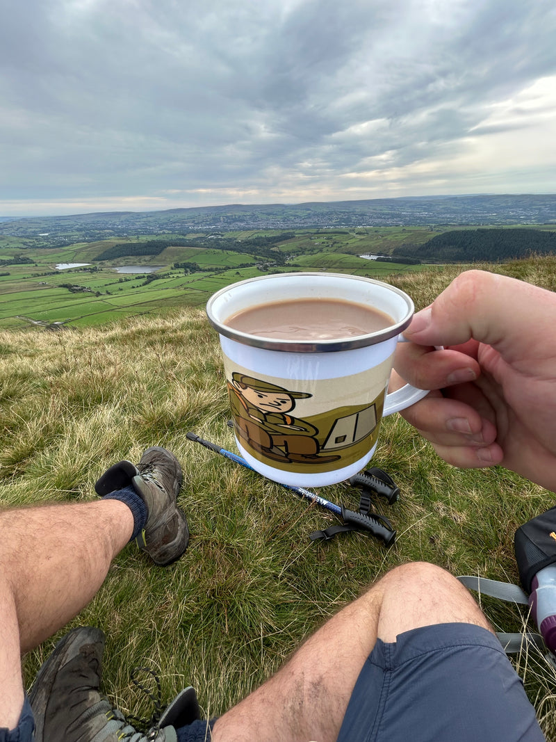 Enamel mug on Pendle Hill 
