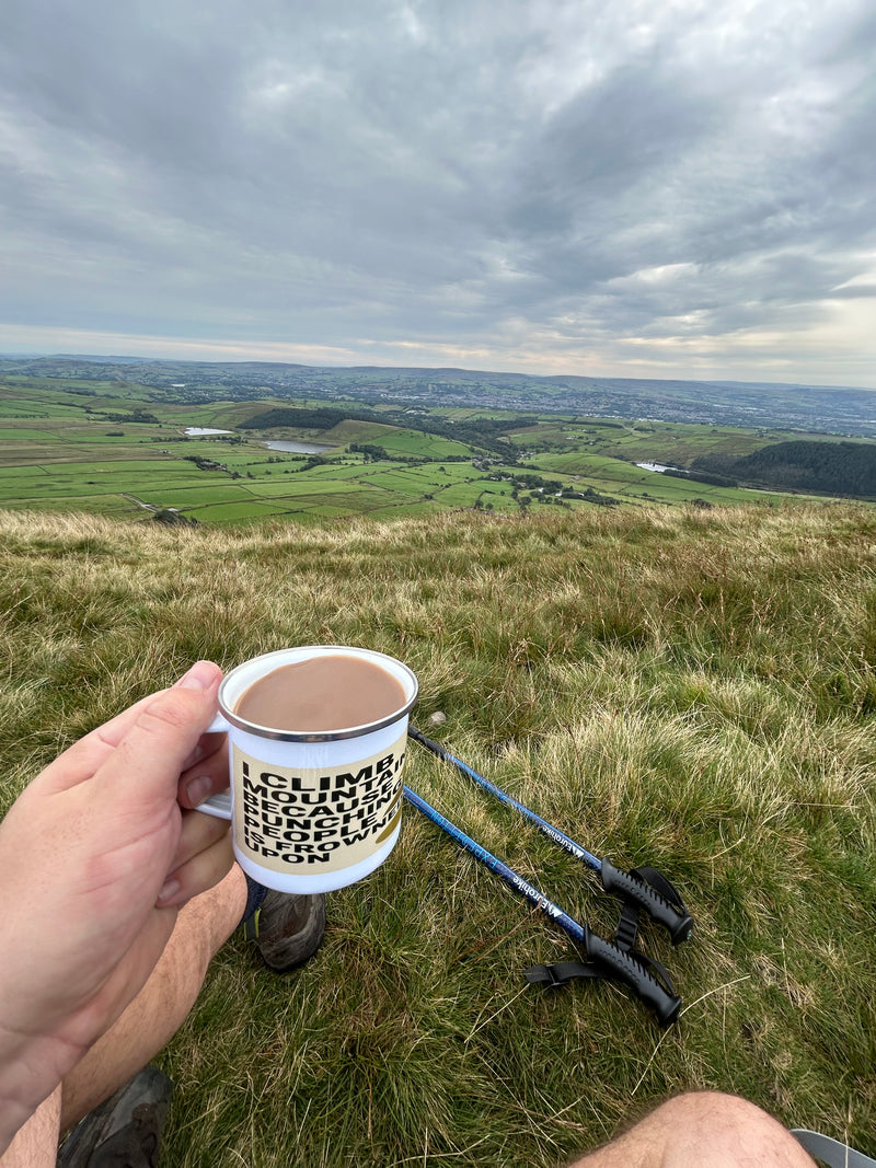 I climb mountains enamel mug on Pendle Hill 