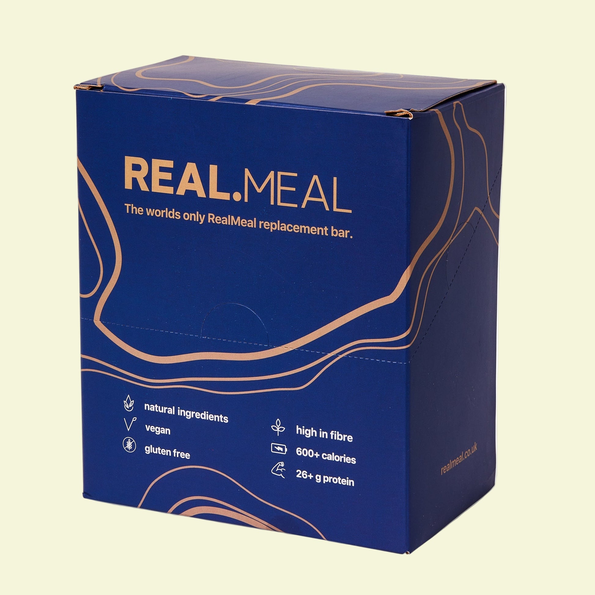 Blue box of RealMeal replacement bar with gold text on a white background