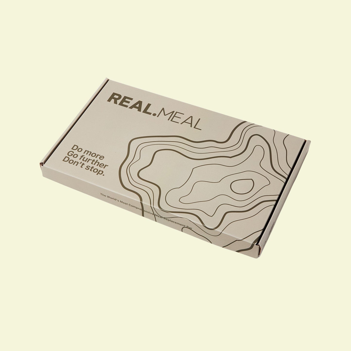 Beige 'REAL.MEAL' box with topographic design on a white background