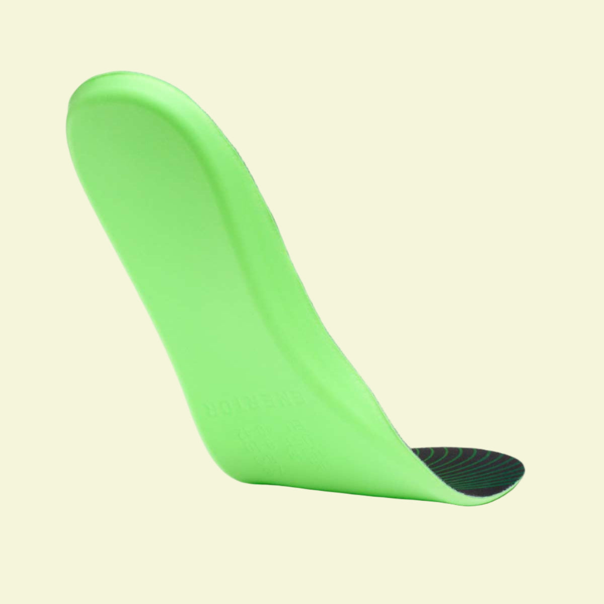 Green shoe insole on a white background