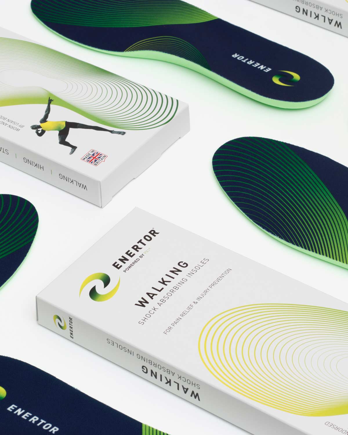 Enertor walking insoles and packaging on a white background