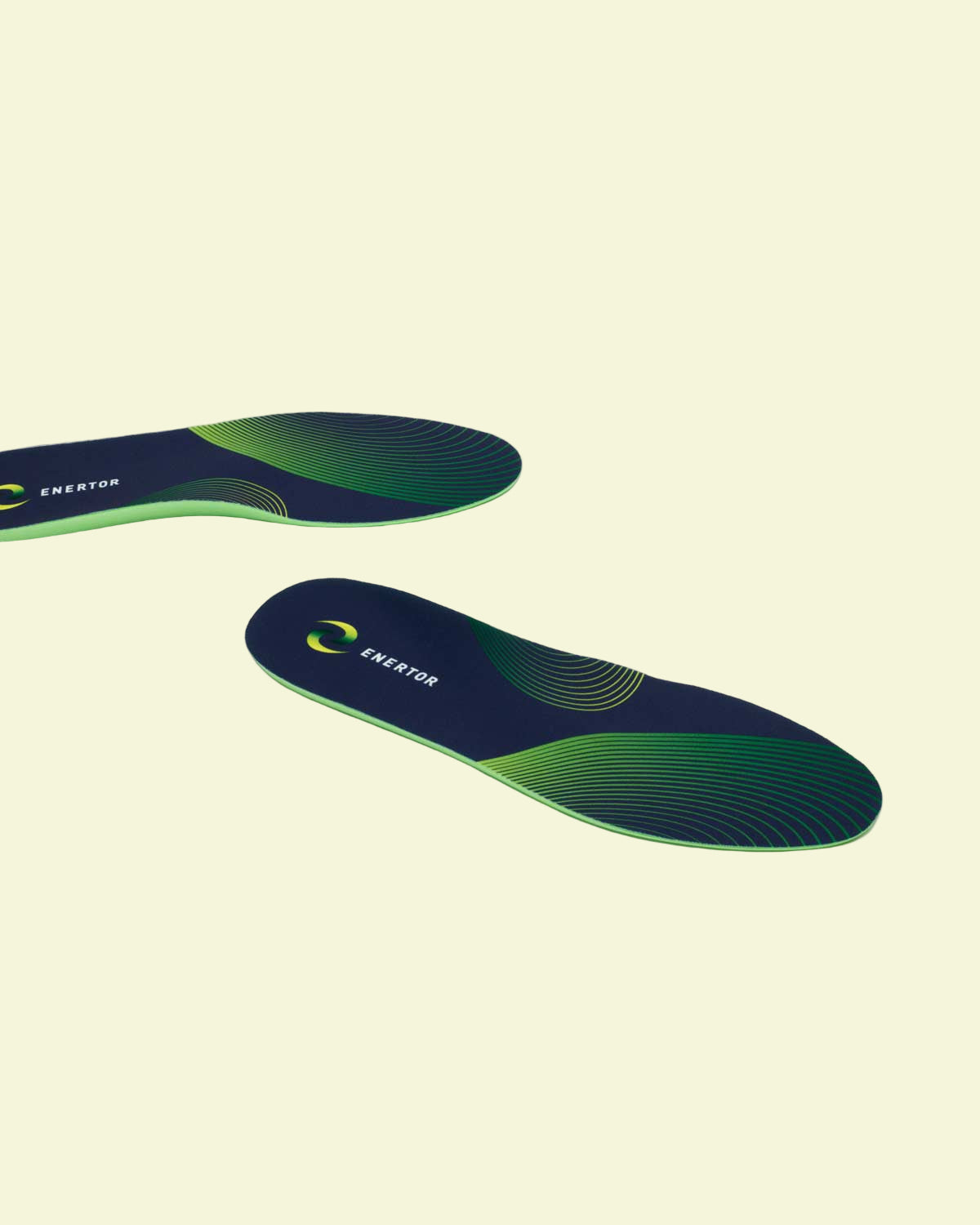 Green and blue shoe insole on a white background