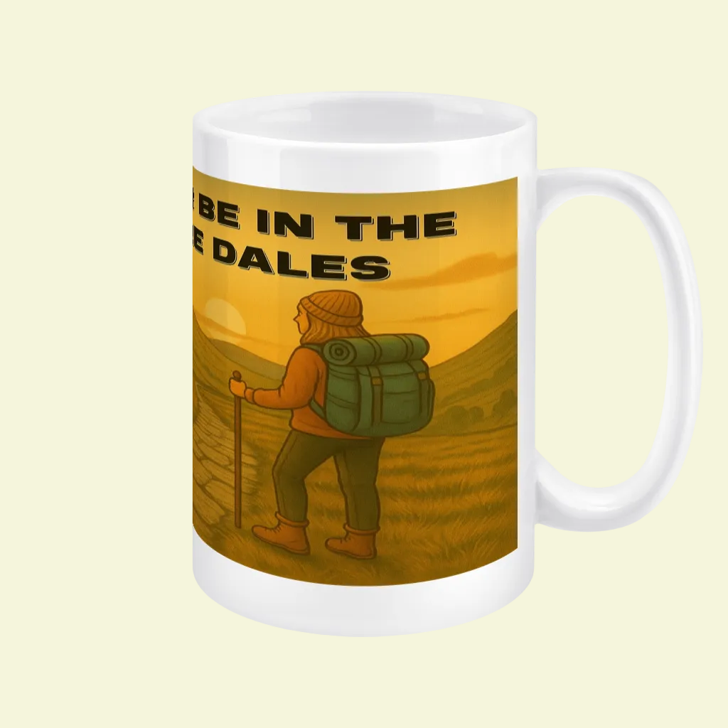White ceramic mug with hiker and "I'd Rather Be in the Yorkshire Dales" text over a sunset landscape.