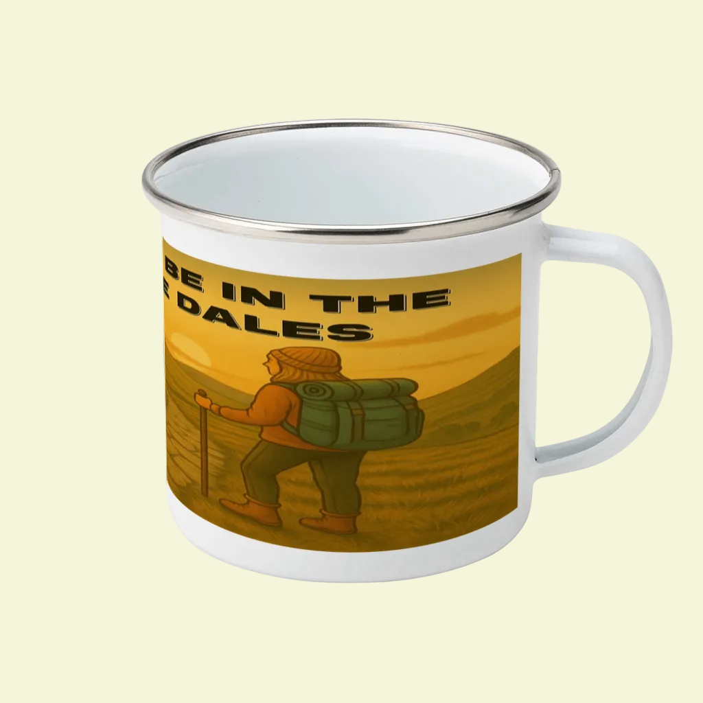 White enamel mug with black rim and hiking design saying "I'd Rather Be In The Yorkshire Dales".